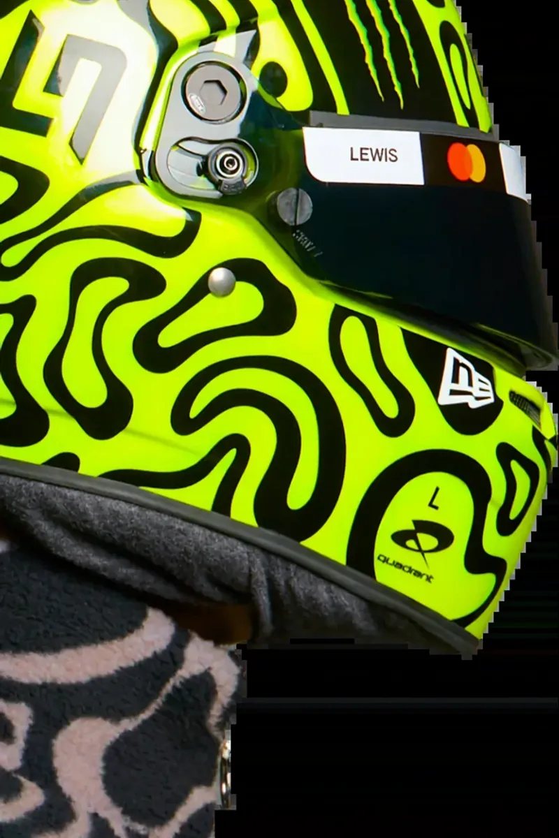 Hamilton 2025 Ferrari era helmet — yellow with LEWIS marking